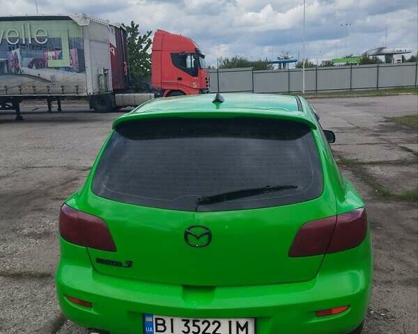 Зелений Мазда 3, об'ємом двигуна 1.4 л та пробігом 260 тис. км за 3200 $, фото 4 на Automoto.ua