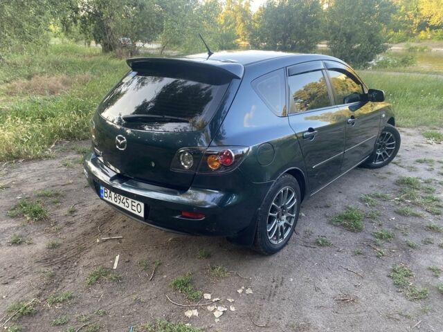 Зеленый Мазда 3, объемом двигателя 1.6 л и пробегом 301 тыс. км за 5200 $, фото 1 на Automoto.ua