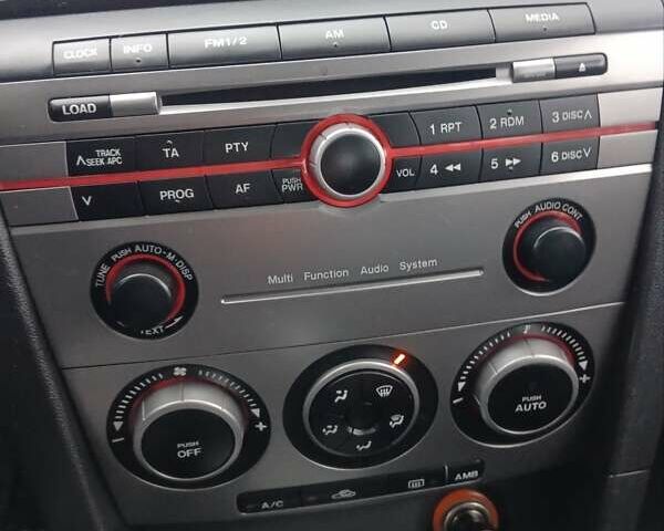 Зелений Мазда 3, об'ємом двигуна 1.6 л та пробігом 200 тис. км за 5999 $, фото 20 на Automoto.ua