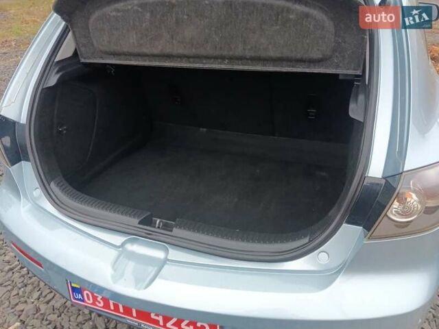 Зелений Мазда 3, об'ємом двигуна 1.6 л та пробігом 200 тис. км за 5999 $, фото 13 на Automoto.ua