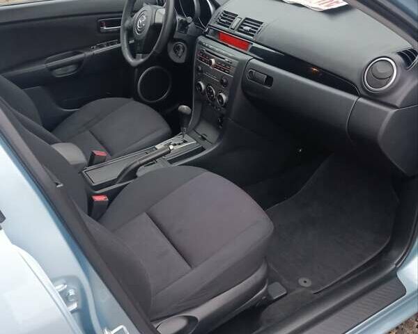 Зелений Мазда 3, об'ємом двигуна 1.6 л та пробігом 200 тис. км за 5999 $, фото 9 на Automoto.ua