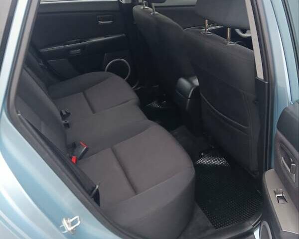 Зелений Мазда 3, об'ємом двигуна 1.6 л та пробігом 200 тис. км за 5999 $, фото 12 на Automoto.ua