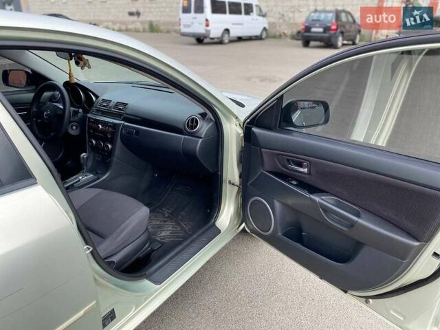 Зеленый Мазда 3, объемом двигателя 1.6 л и пробегом 254 тыс. км за 5200 $, фото 12 на Automoto.ua