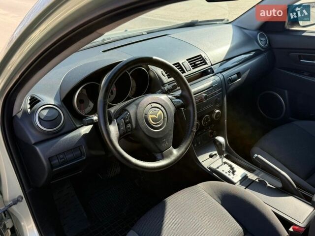 Зелений Мазда 3, об'ємом двигуна 1.6 л та пробігом 160 тис. км за 6800 $, фото 15 на Automoto.ua