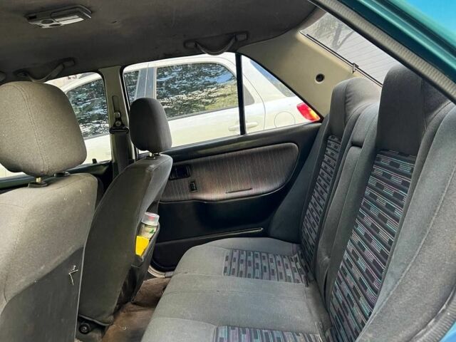 Зеленый Мазда 3, объемом двигателя 1 л и пробегом 420 тыс. км за 797 $, фото 2 на Automoto.ua