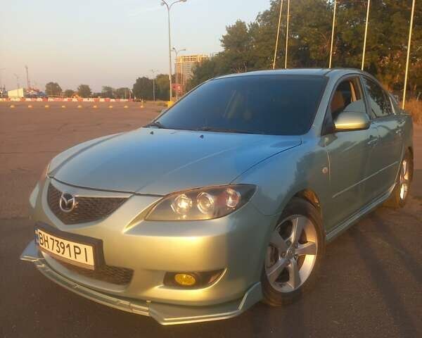 Зеленый Мазда 3, объемом двигателя 2 л и пробегом 177 тыс. км за 5600 $, фото 7 на Automoto.ua