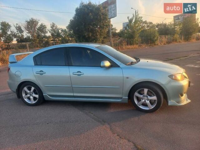 Зеленый Мазда 3, объемом двигателя 2 л и пробегом 177 тыс. км за 5600 $, фото 2 на Automoto.ua