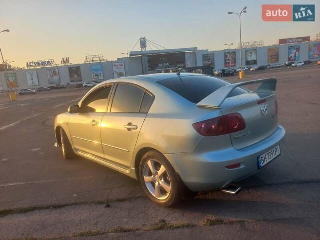 Зеленый Мазда 3, объемом двигателя 2 л и пробегом 177 тыс. км за 5600 $, фото 3 на Automoto.ua