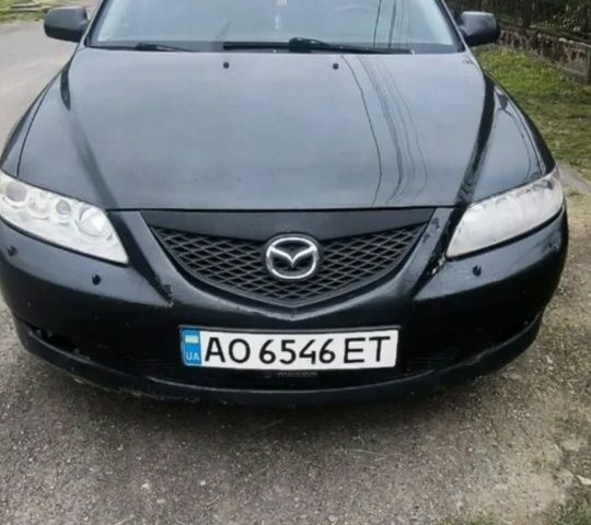 Зеленый Мазда 3, объемом двигателя 0 л и пробегом 257 тыс. км за 3000 $, фото 4 на Automoto.ua