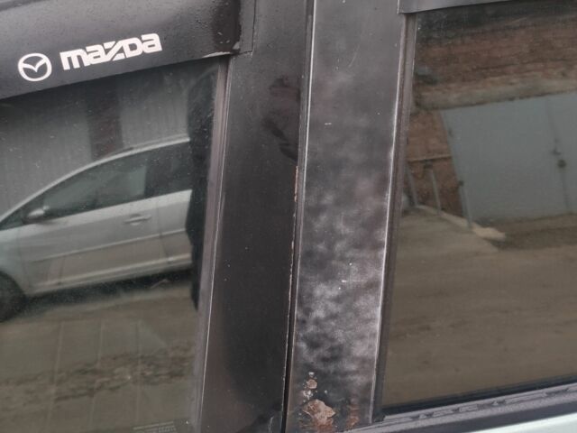 Зеленый Мазда 3, объемом двигателя 1.6 л и пробегом 253 тыс. км за 3550 $, фото 9 на Automoto.ua