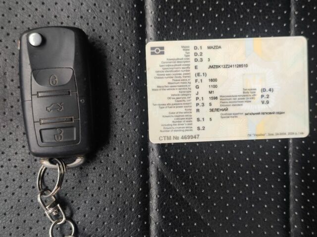 Зеленый Мазда 3, объемом двигателя 1.6 л и пробегом 253 тыс. км за 3550 $, фото 5 на Automoto.ua