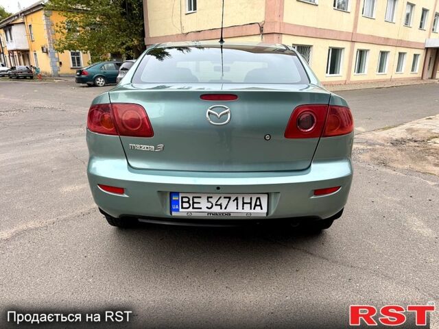 Зелений Мазда 3, об'ємом двигуна 1.6 л та пробігом 340 тис. км за 3850 $, фото 5 на Automoto.ua
