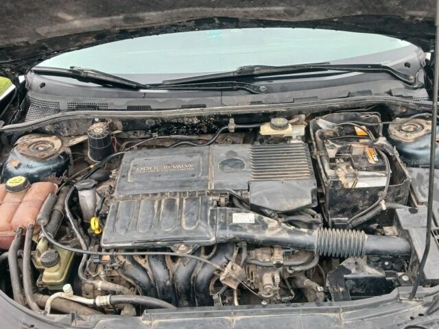 Зелений Мазда 3, об'ємом двигуна 1.6 л та пробігом 3 тис. км за 4500 $, фото 7 на Automoto.ua