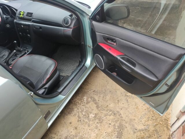 Зеленый Мазда 3, объемом двигателя 1.6 л и пробегом 253 тыс. км за 3550 $, фото 12 на Automoto.ua