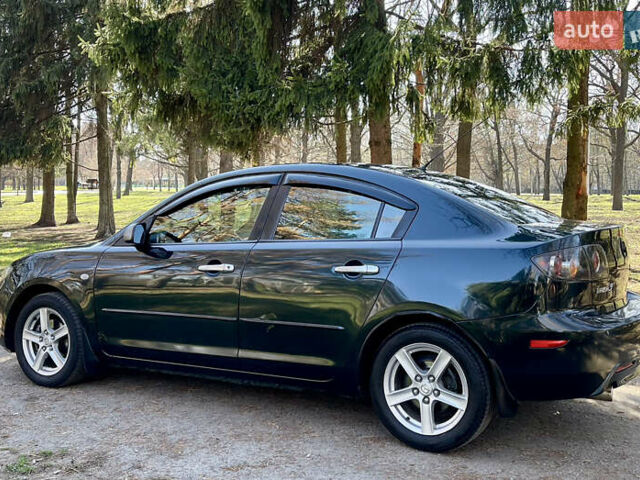 Зелений Мазда 3, об'ємом двигуна 2 л та пробігом 170 тис. км за 4000 $, фото 12 на Automoto.ua