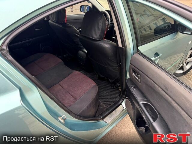 Зелений Мазда 3, об'ємом двигуна 1.6 л та пробігом 340 тис. км за 3850 $, фото 9 на Automoto.ua