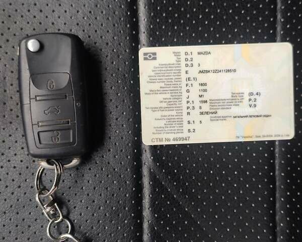 Зеленый Мазда 3, объемом двигателя 1.6 л и пробегом 253 тыс. км за 3550 $, фото 4 на Automoto.ua