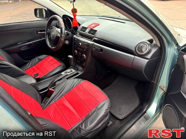 Зелений Мазда 3, об'ємом двигуна 1.6 л та пробігом 340 тис. км за 3850 $, фото 8 на Automoto.ua