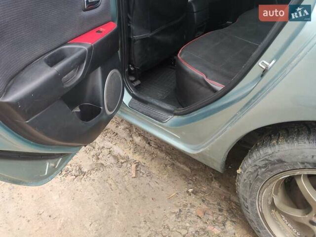 Зеленый Мазда 3, объемом двигателя 1.6 л и пробегом 253 тыс. км за 3550 $, фото 12 на Automoto.ua