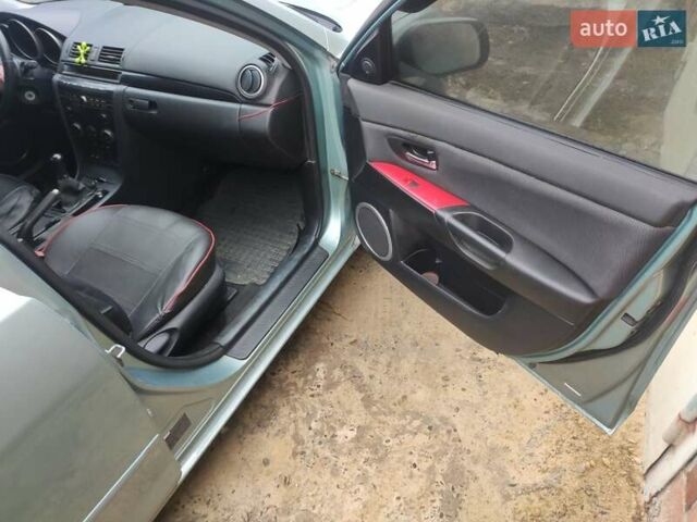 Зеленый Мазда 3, объемом двигателя 1.6 л и пробегом 253 тыс. км за 3550 $, фото 11 на Automoto.ua
