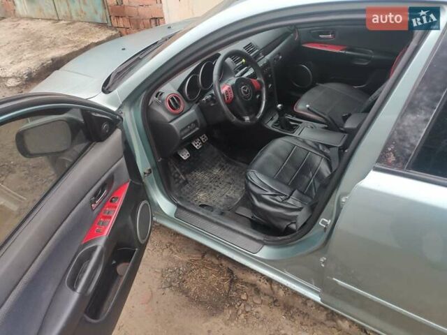 Зеленый Мазда 3, объемом двигателя 1.6 л и пробегом 253 тыс. км за 3550 $, фото 10 на Automoto.ua