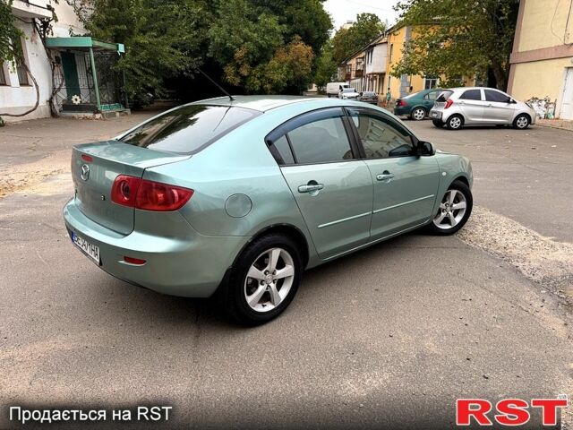 Зелений Мазда 3, об'ємом двигуна 1.6 л та пробігом 340 тис. км за 3850 $, фото 4 на Automoto.ua