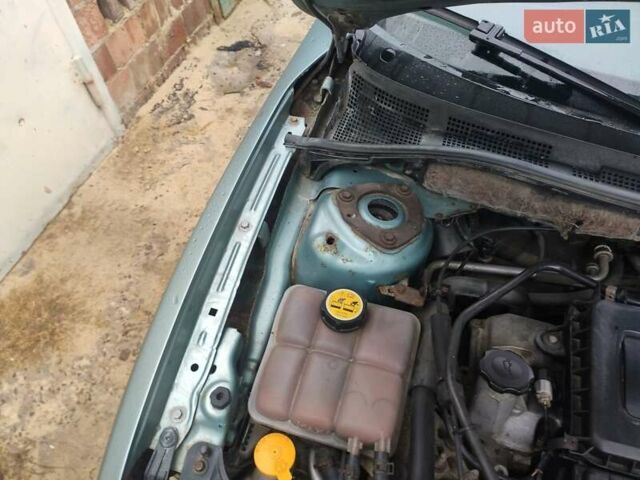 Зеленый Мазда 3, объемом двигателя 1.6 л и пробегом 253 тыс. км за 3550 $, фото 7 на Automoto.ua