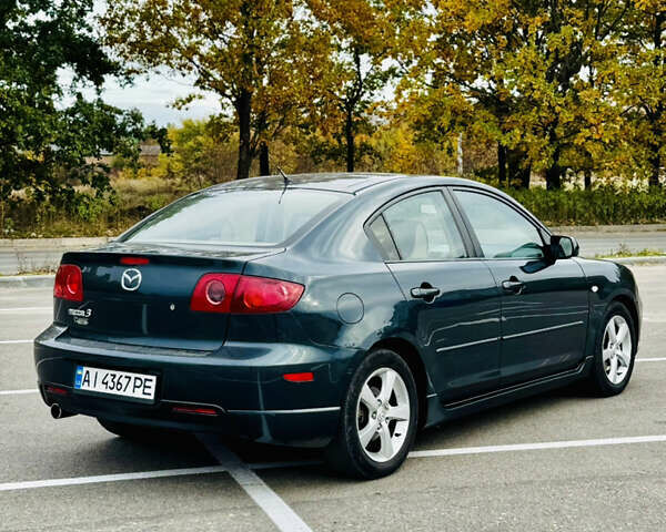 Зеленый Мазда 3, объемом двигателя 2 л и пробегом 253 тыс. км за 4300 $, фото 4 на Automoto.ua
