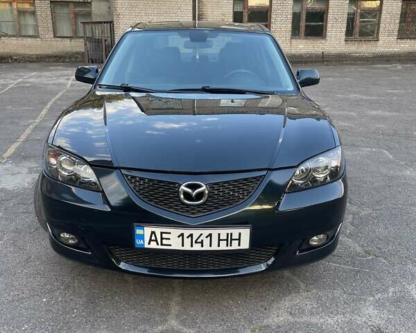 Зеленый Мазда 3, объемом двигателя 1.6 л и пробегом 155 тыс. км за 6099 $, фото 4 на Automoto.ua