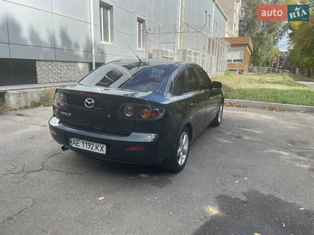 Зеленый Мазда 3, объемом двигателя 2 л и пробегом 176 тыс. км за 5700 $, фото 5 на Automoto.ua
