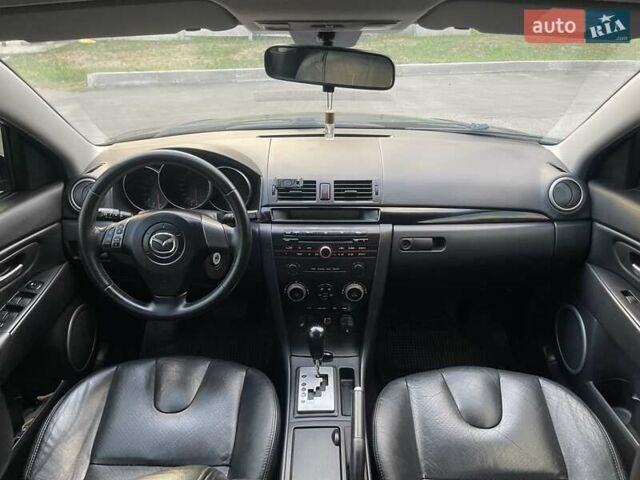 Зеленый Мазда 3, объемом двигателя 1.6 л и пробегом 155 тыс. км за 6099 $, фото 13 на Automoto.ua