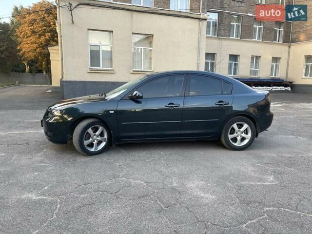 Зеленый Мазда 3, объемом двигателя 1.6 л и пробегом 155 тыс. км за 6099 $, фото 5 на Automoto.ua