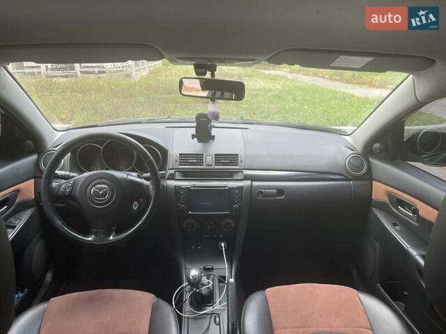 Зеленый Мазда 3, объемом двигателя 2 л и пробегом 176 тыс. км за 5700 $, фото 12 на Automoto.ua