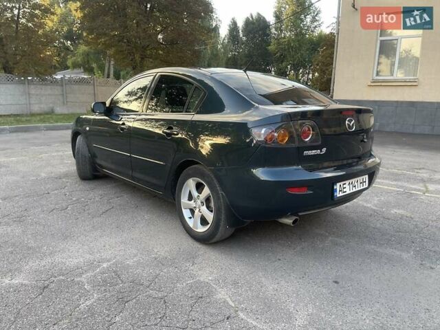 Зеленый Мазда 3, объемом двигателя 1.6 л и пробегом 155 тыс. км за 6099 $, фото 1 на Automoto.ua
