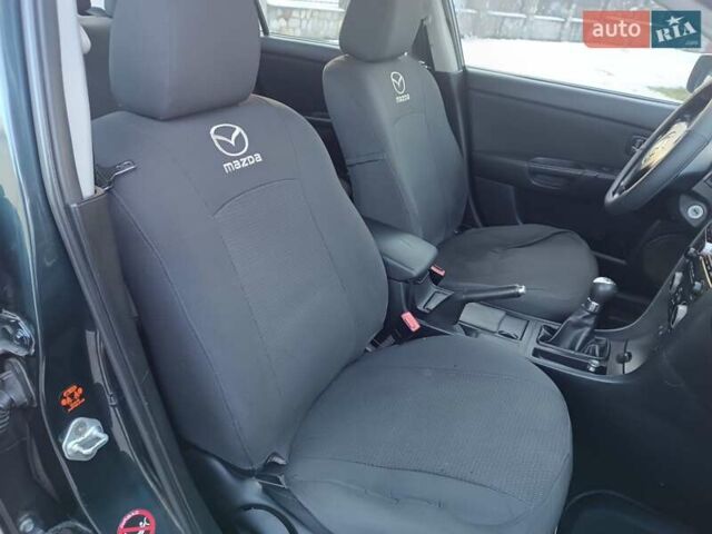 Зелений Мазда 3, об'ємом двигуна 1.6 л та пробігом 254 тис. км за 4200 $, фото 9 на Automoto.ua