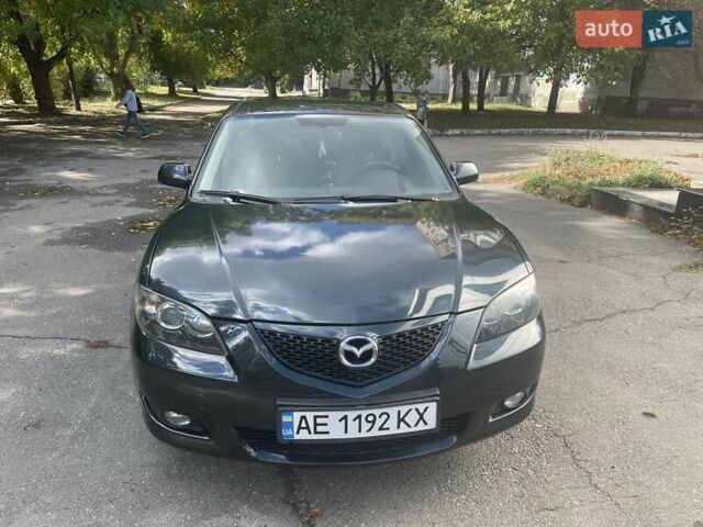 Зеленый Мазда 3, объемом двигателя 2 л и пробегом 176 тыс. км за 5700 $, фото 2 на Automoto.ua