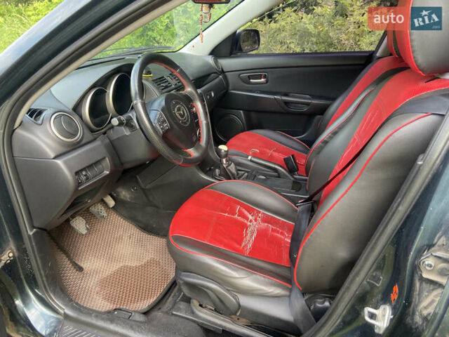 Зеленый Мазда 3, объемом двигателя 1.6 л и пробегом 230 тыс. км за 2999 $, фото 9 на Automoto.ua