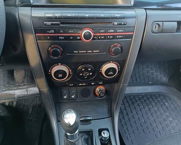 Зелений Мазда 3, об'ємом двигуна 1.6 л та пробігом 254 тис. км за 4200 $, фото 12 на Automoto.ua