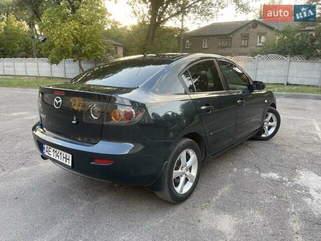 Зеленый Мазда 3, объемом двигателя 1.6 л и пробегом 155 тыс. км за 6099 $, фото 3 на Automoto.ua