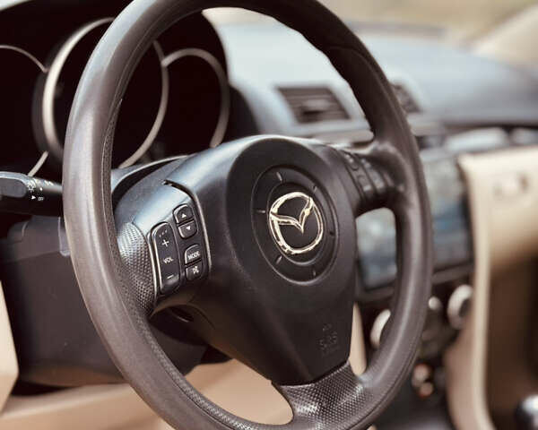 Зеленый Мазда 3, объемом двигателя 2 л и пробегом 253 тыс. км за 4300 $, фото 9 на Automoto.ua