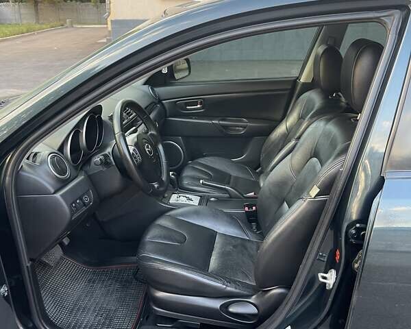 Зеленый Мазда 3, объемом двигателя 1.6 л и пробегом 155 тыс. км за 6099 $, фото 7 на Automoto.ua