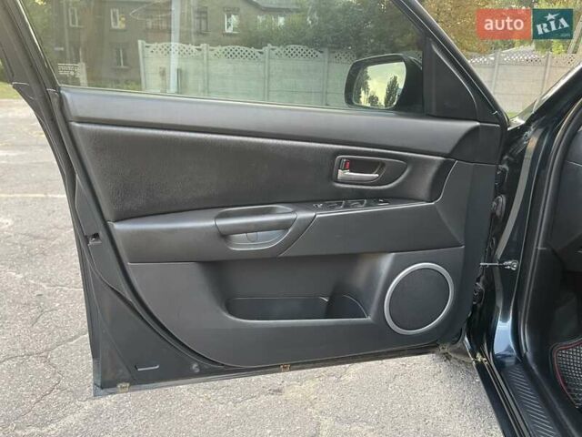 Зеленый Мазда 3, объемом двигателя 1.6 л и пробегом 155 тыс. км за 6099 $, фото 9 на Automoto.ua