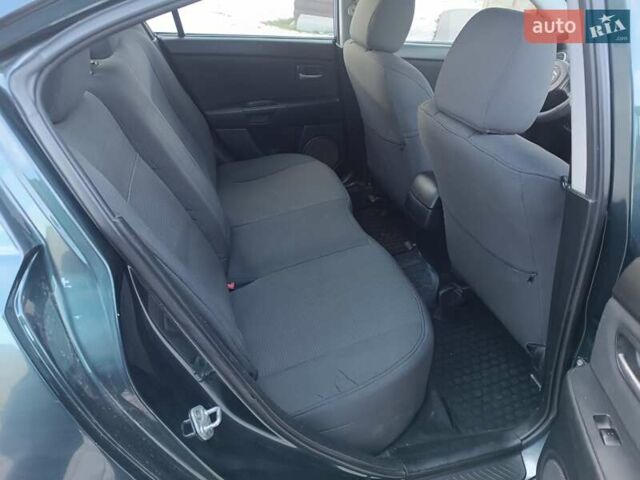 Зелений Мазда 3, об'ємом двигуна 1.6 л та пробігом 254 тис. км за 4200 $, фото 10 на Automoto.ua