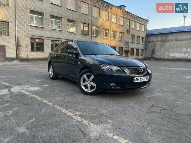 Зеленый Мазда 3, объемом двигателя 1.6 л и пробегом 155 тыс. км за 6099 $, фото 6 на Automoto.ua