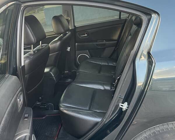 Зеленый Мазда 3, объемом двигателя 1.6 л и пробегом 155 тыс. км за 6099 $, фото 10 на Automoto.ua