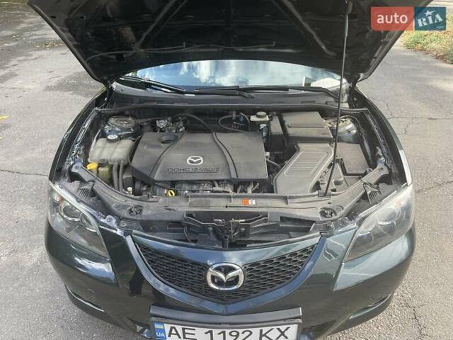 Зеленый Мазда 3, объемом двигателя 2 л и пробегом 176 тыс. км за 5700 $, фото 9 на Automoto.ua