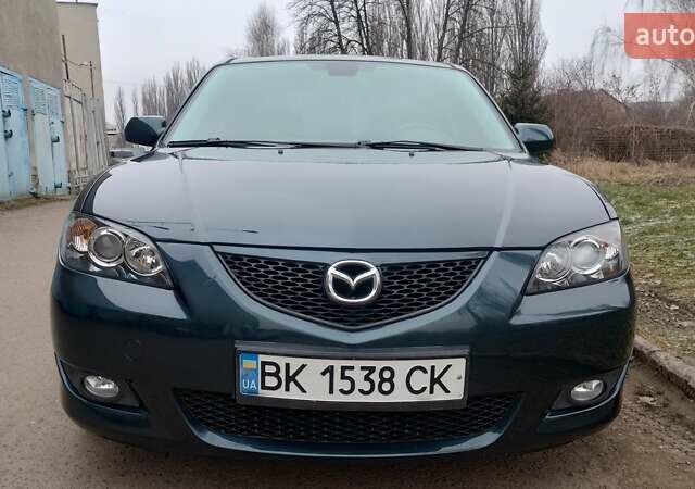 Зелений Мазда 3, об'ємом двигуна 1.6 л та пробігом 292 тис. км за 6000 $, фото 3 на Automoto.ua