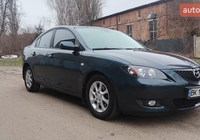 Зелений Мазда 3, об'ємом двигуна 1.6 л та пробігом 292 тис. км за 6000 $, фото 4 на Automoto.ua