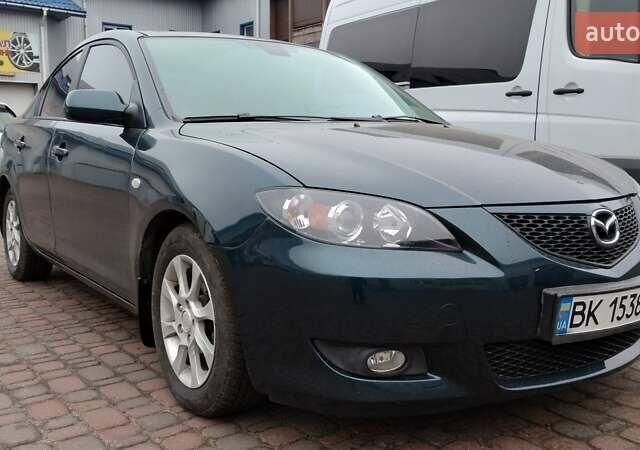 Зелений Мазда 3, об'ємом двигуна 1.6 л та пробігом 292 тис. км за 6000 $, фото 5 на Automoto.ua