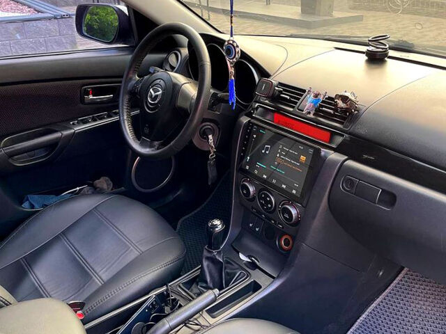 Зелений Мазда 3, об'ємом двигуна 1.6 л та пробігом 202 тис. км за 4900 $, фото 5 на Automoto.ua